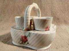 Vintage egg cups with a matching basket. Germany. I950's.