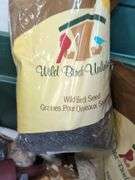 Variety of bird seed and suet cakes. 2a