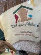 Variety of bird seed and suet cakes. 2a