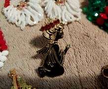 Vintage Christmas brooches and earrings. Beautiful leaded glass ornament.