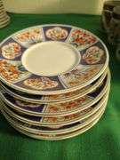 Oriental set of dishes 12 cups 12 saucers