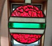 Vintage Christmas brooches and earrings. Beautiful leaded glass ornament.