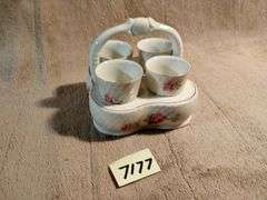 Vintage egg cups with a matching basket. Germany. I950's.