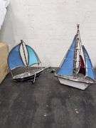 Pair of metal and glass sailboat figures. 2d