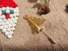 Vintage Christmas brooches and earrings. Beautiful leaded glass ornament.