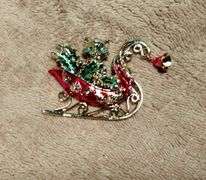 Vintage Christmas brooches and earrings. Beautiful leaded glass ornament.
