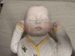 Porcelain baby doll marked Original by Joyce Wolf 16"