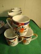 Oriental set of dishes 12 cups 12 saucers
