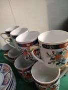 Oriental set of dishes 12 cups 12 saucers