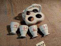 Vintage egg cups with a matching basket. Germany. I950's.