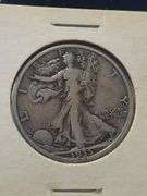 1935 S Silver Walking Liberty Half Dollar