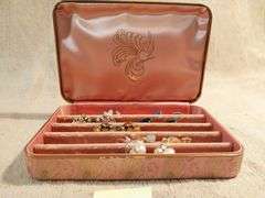 Vintage earrings in a vintage jewelry box.