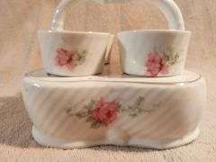 Vintage egg cups with a matching basket. Germany. I950's.