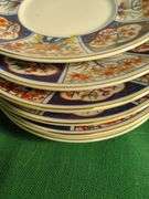 Oriental set of dishes 12 cups 12 saucers