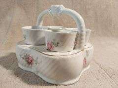 Vintage egg cups with a matching basket. Germany. I950's.