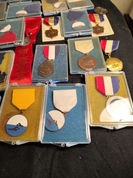 Swimming medals lots of them
