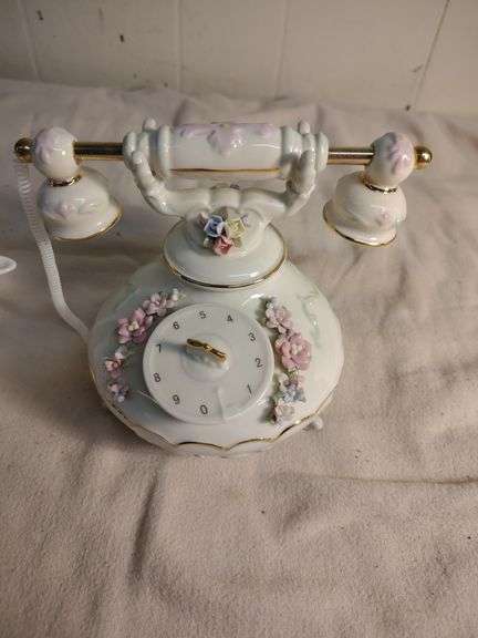 Telephone and teapot music box figurines