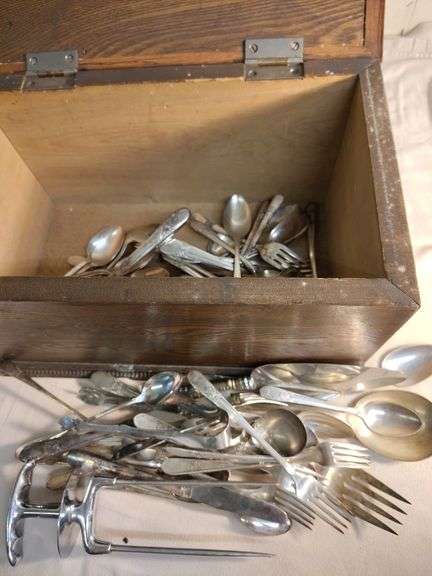 Wood chest with silverware