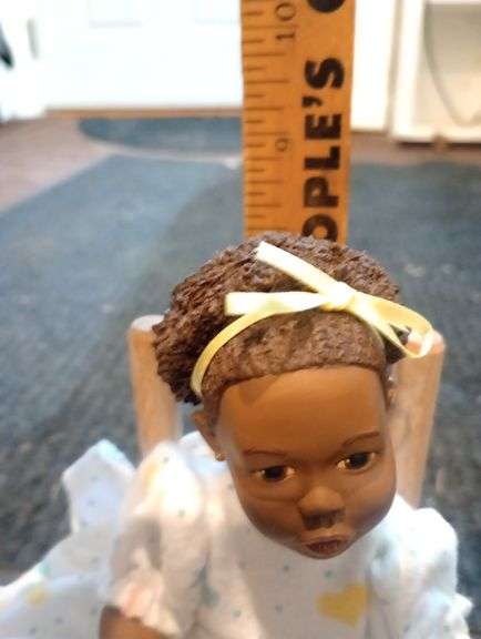 Anika doll in rocking chair- signed, numbered and dated