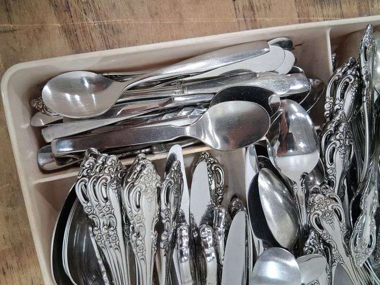 Cutlery organizer full of Oneida community forks/spoons/ knives. 3c