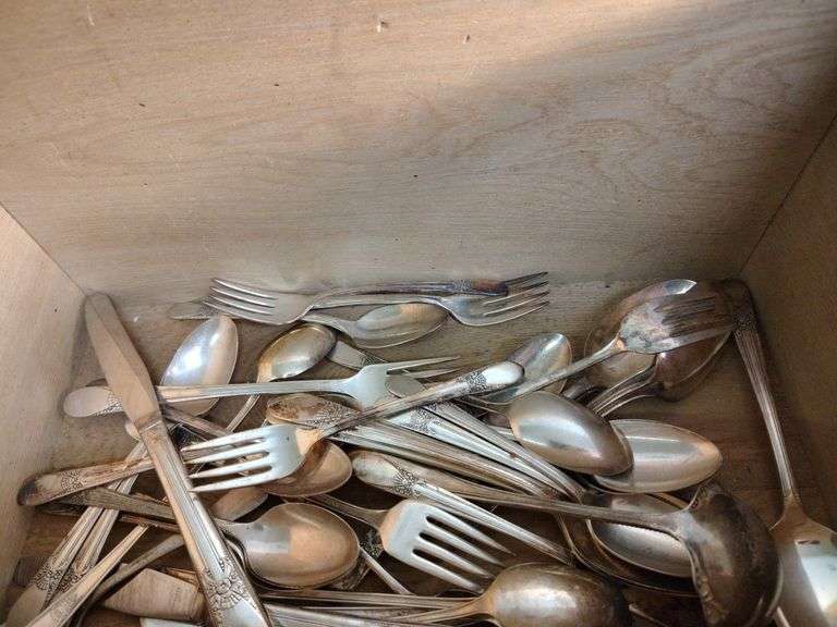 Wood chest with silverware
