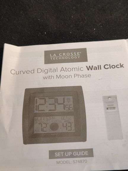 La Crosse curved digital atomic wall clock with moon phase has remote