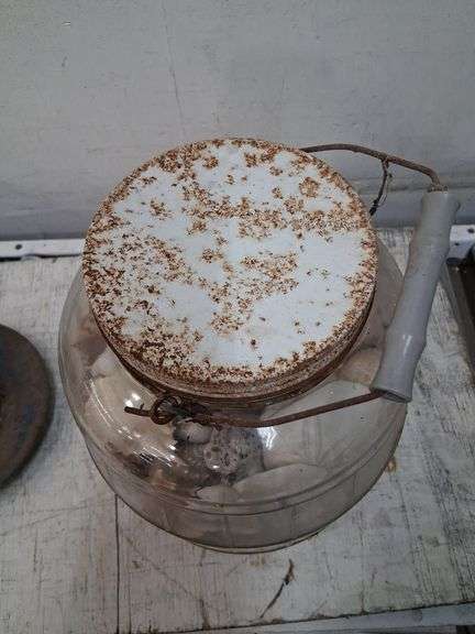 Large glass jar full of shells. 1c