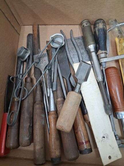 Box lot tools: chisels, saw blades, bits, and more. 2d