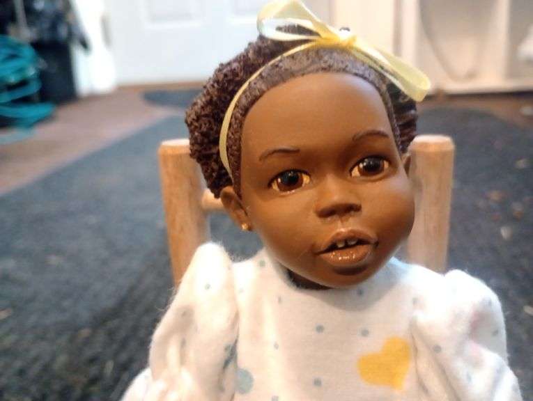 Anika doll in rocking chair- signed, numbered and dated