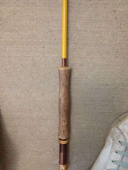 Vintage fishing pole in case