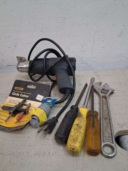 Heat gun, circle cutter, mender, and hand tools. 3c