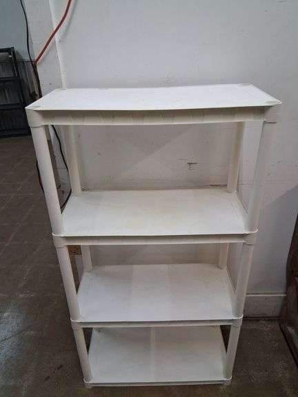 White Plano plastic shelves