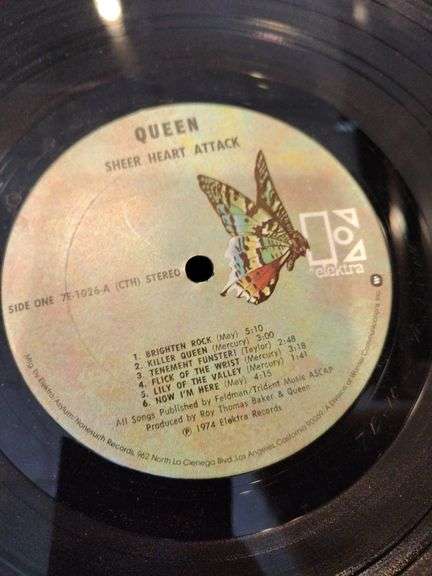 Box of albums variety Queen, Bob Dillon, Folk songs, and more
