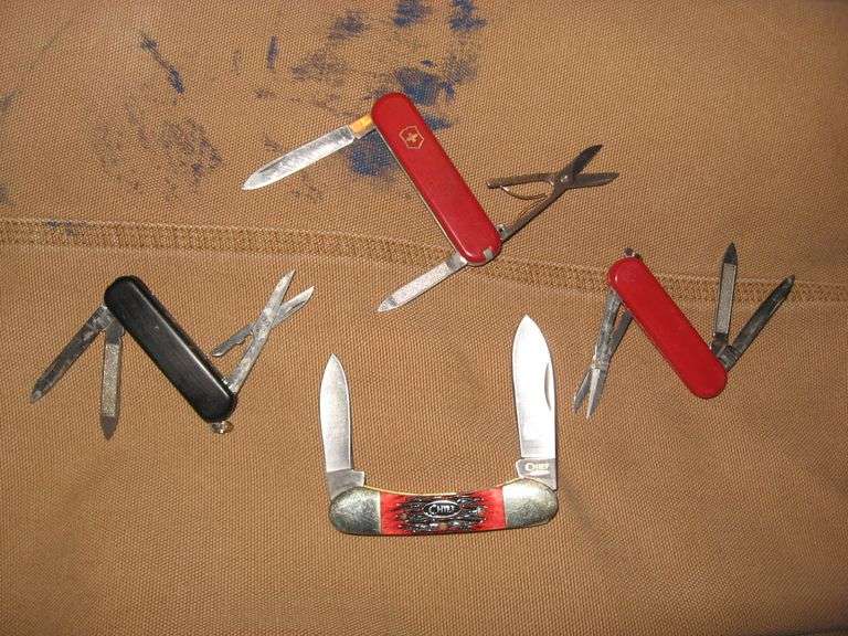 4 KNIVES-3 SWISS ARMY & A CHIEF KNIFE