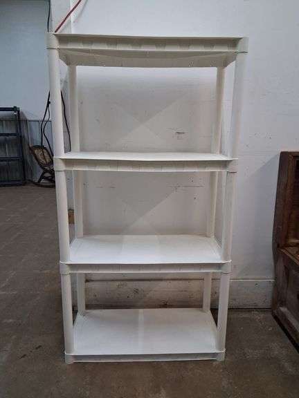 White Plano plastic shelves
