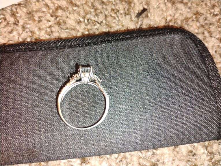 925 ring, i think its a size 11 its big this one very nice looking, maybe stones on side missing?