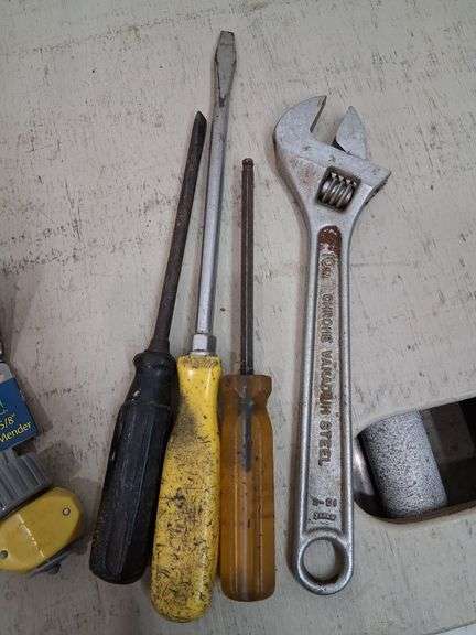 Heat gun, circle cutter, mender, and hand tools. 3c