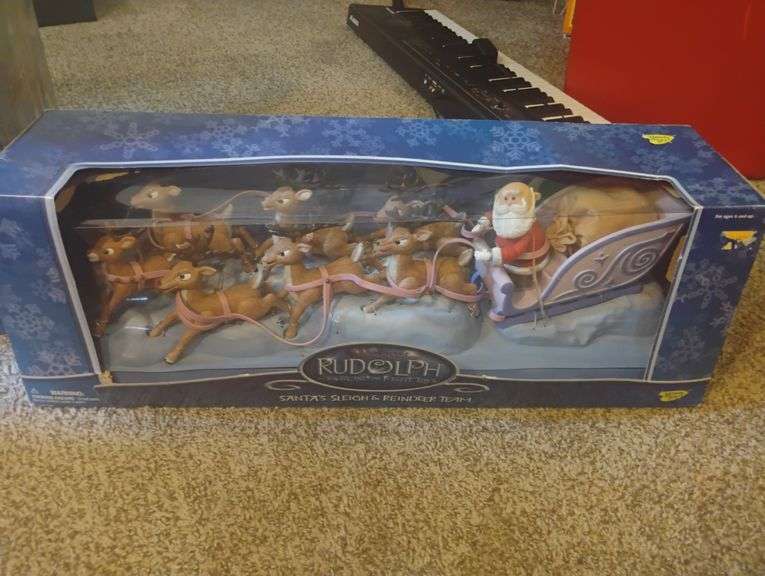RUDOLPH ISLAND OF MISFIT TOYS SANTAS SLEIGH AND REINDEER TEAM