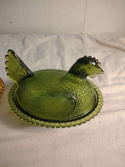 2 Hens on a nest