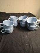 Blue Fiesta 8 cups and 8 saucers