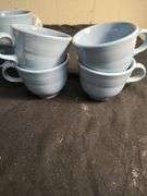 Blue Fiesta 8 cups and 8 saucers