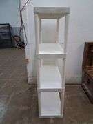 White Plano plastic shelves