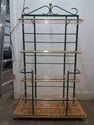 Green and gold metal shelf