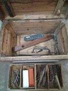 Wooden tool trunk with contents