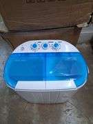 NIB Compact washing machine. BIN $50