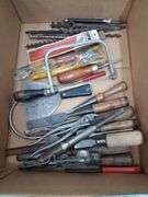 Box lot tools: chisels, saw blades, bits, and more. 2d
