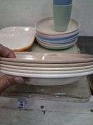 Anchor hocking divided plates, Rubbermaid trays, and wheatstraw plates and cups. 7e