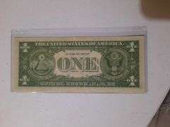 Star Note 1957 $1 Silver certificate in plastic holder