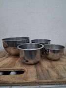 Small pyrex and fire king glass bowls and metal mixing bowls. 3d