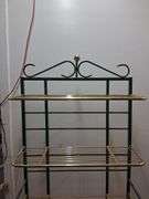 Green and gold metal shelf